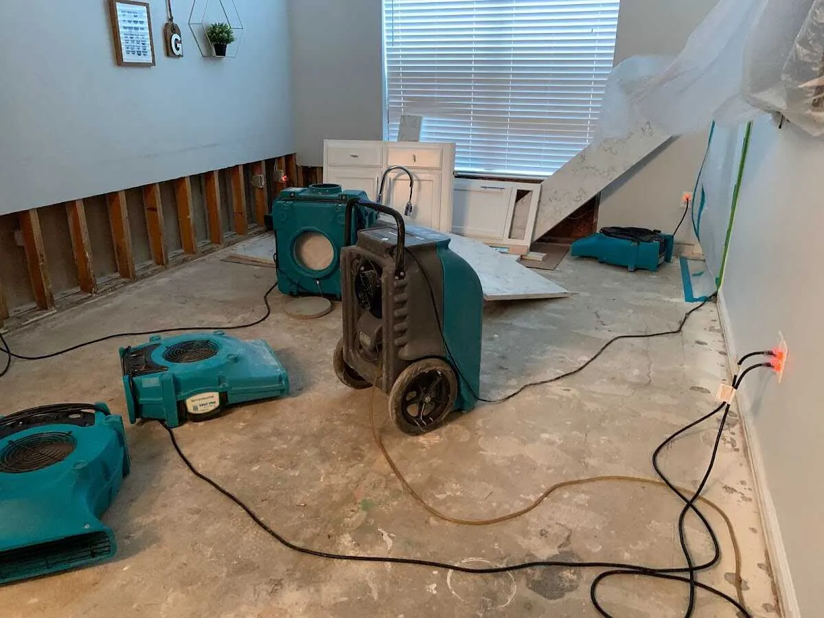 Dehumidifier in flood-cut room for Water Damage Restoration in Chicopee